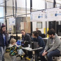 Two community visitors looking at a project.